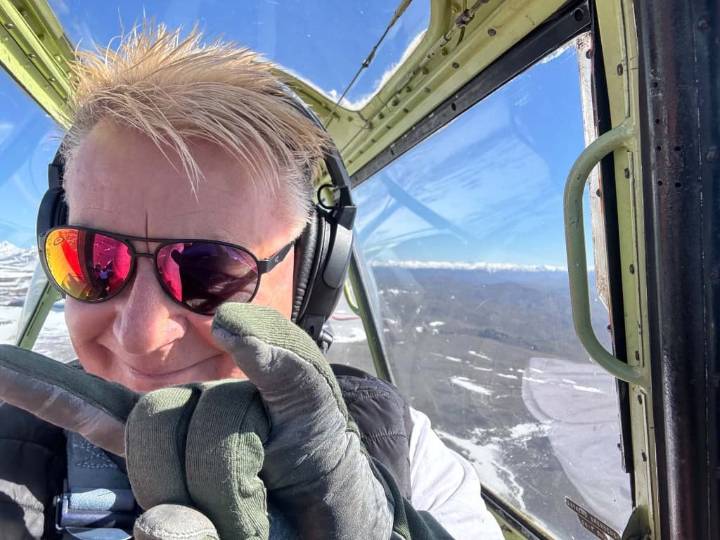 Grant Stewart in the cockpit, giving a thumbs up